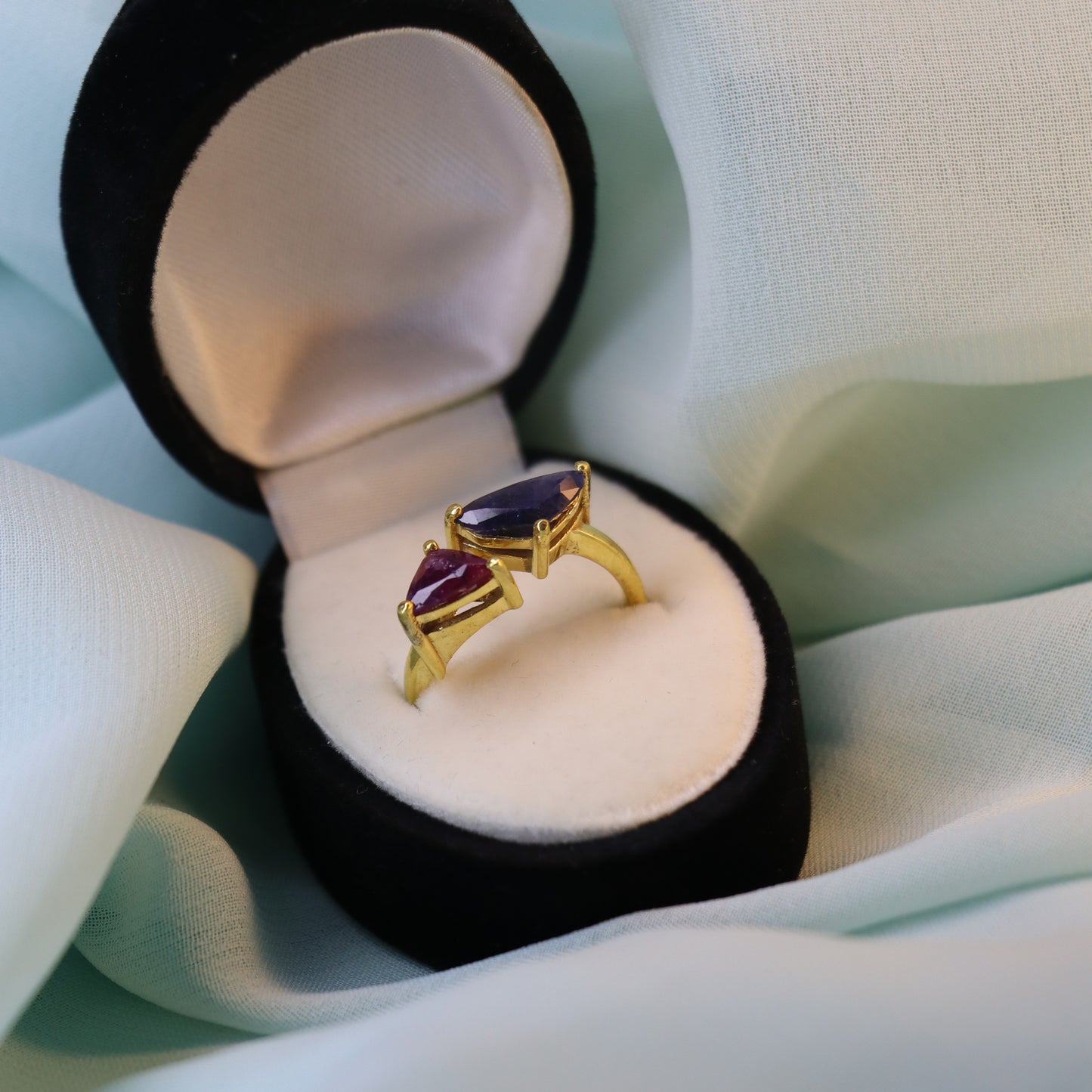 Royal Convergence – Blue Sapphire and Garnet Triangle-Shaped Gold Ring | Sovereign Splendor Forbidden Collection