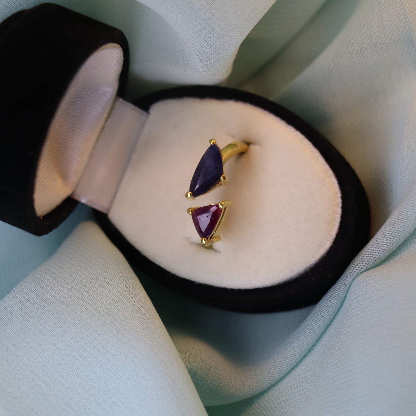 Royal Convergence – Blue Sapphire and Garnet Triangle-Shaped Gold Ring | Sovereign Splendor Forbidden Collection