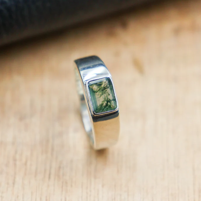 Mystic Radiance – The Rutile Peridot Emerald Shape Ring | Quotidian Opulence Collection