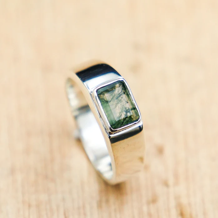 Mystic Radiance – The Rutile Peridot Emerald Shape Ring | Quotidian Opulence Collection